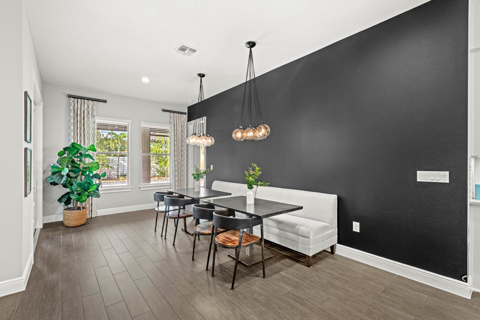 breakfast nook with black wall